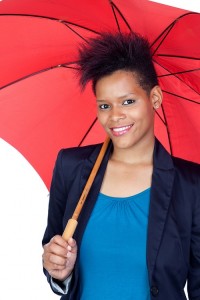 African girl with a umbrella isolated on white background